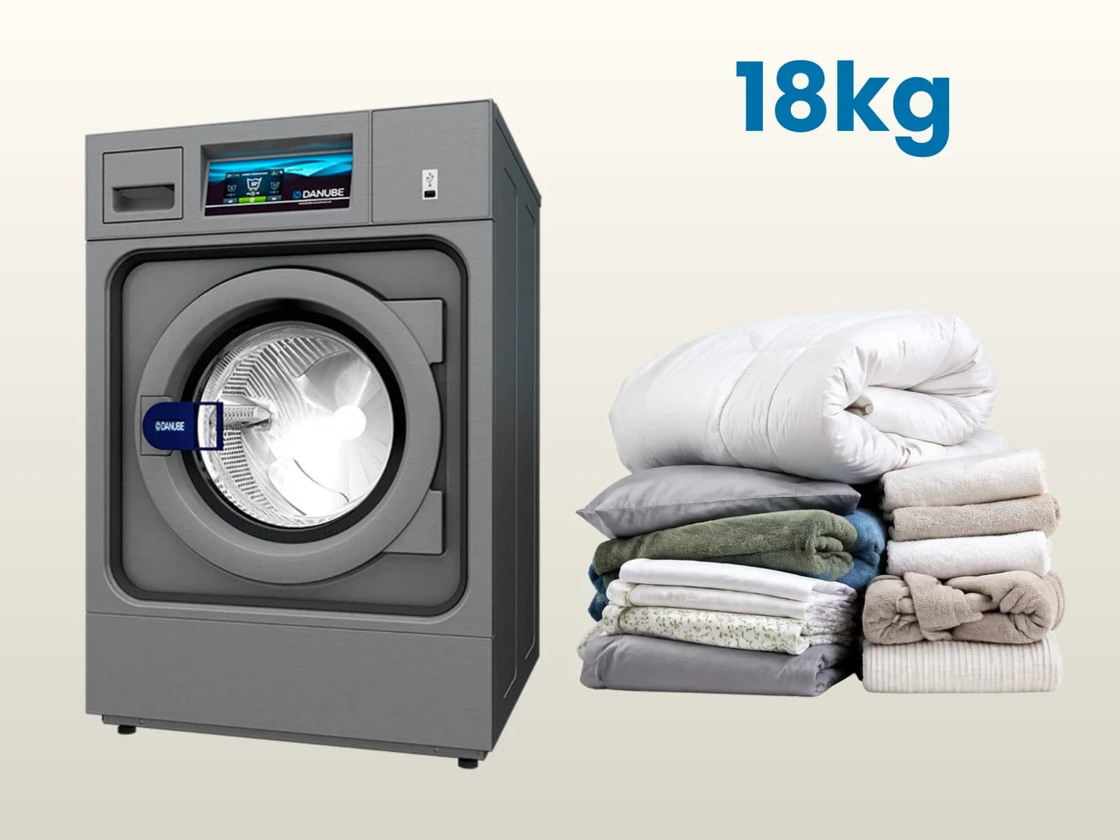 Machine à laver de 18 kg à côté d’une couette, d’un oreiller et de linge de maison